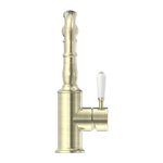 Load image into Gallery viewer, YORK BASIN MIXER HOOK SPOUT WITH WHITE PORCELAIN LEVER AGED BRASS
